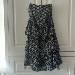 Beautiful strapless minidress with ruffled bottom